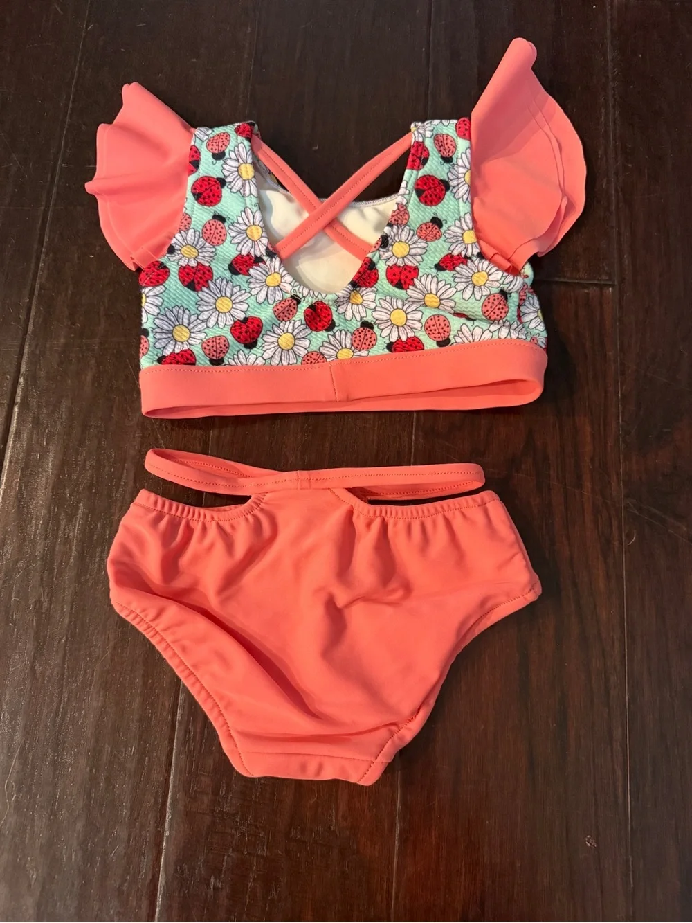 Coral Pink Daisy & Ladybug Kids Two-Piece Swim Set emerald city dancewear